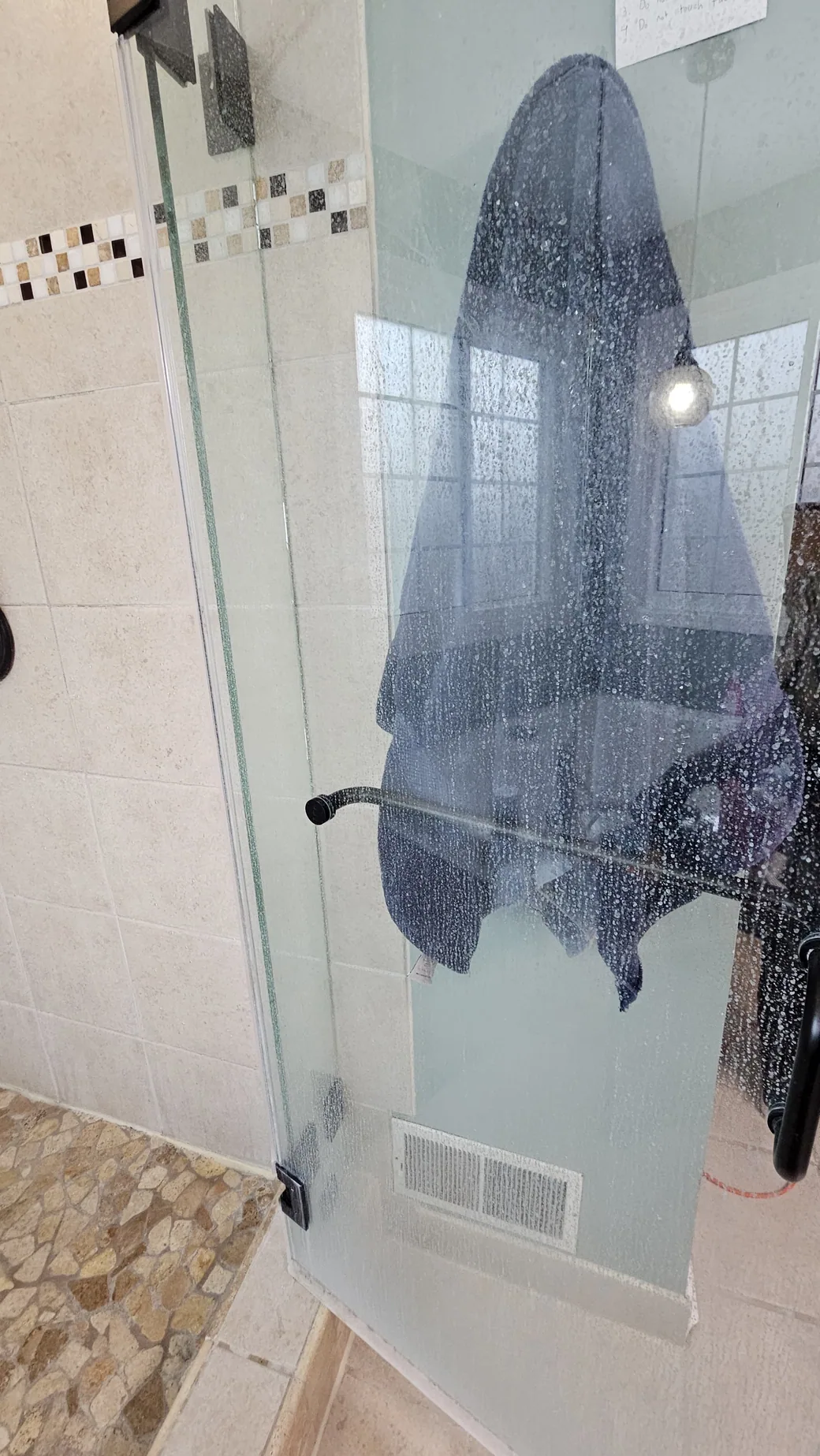 Shower glass cleaning detail in progress