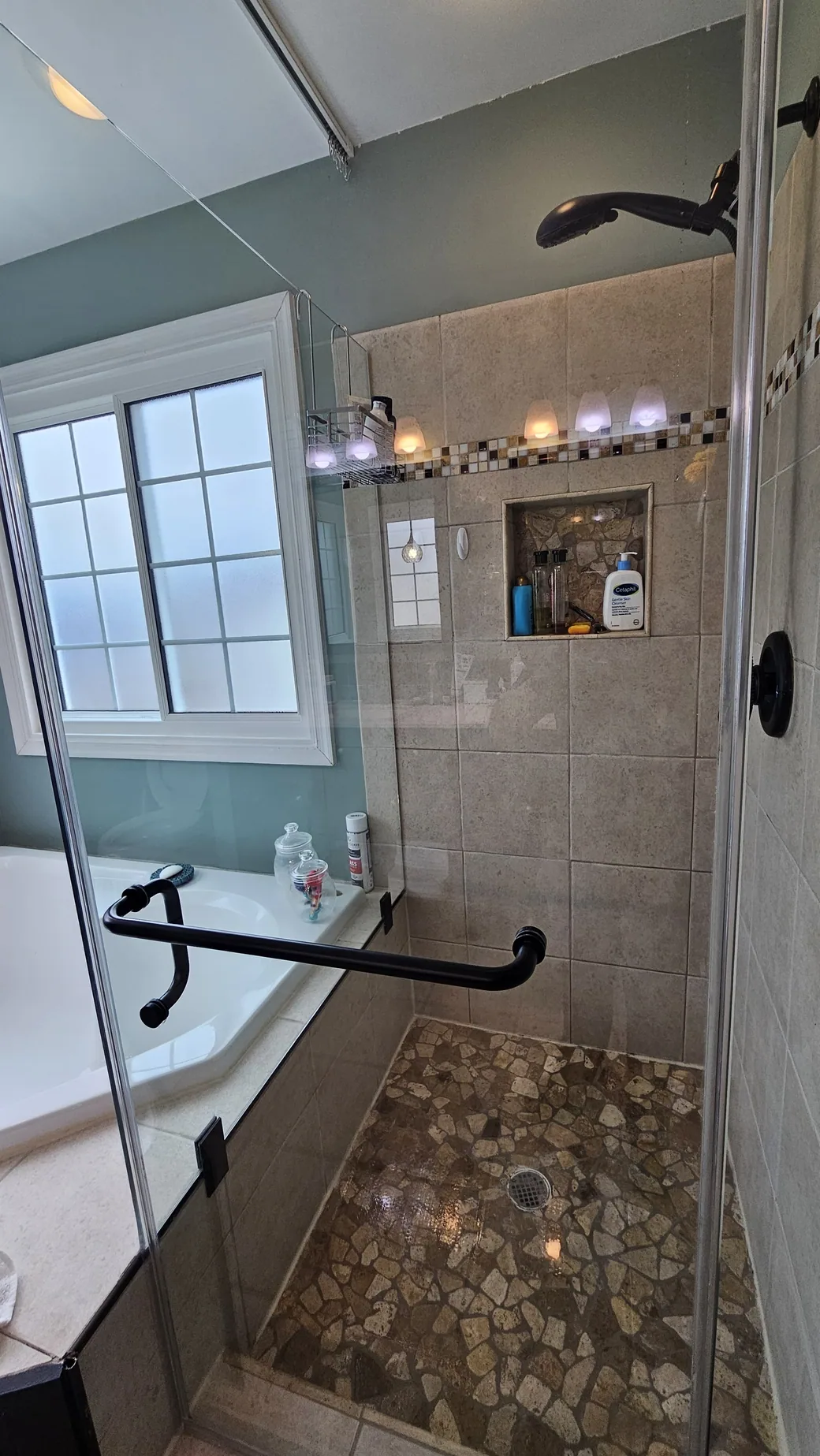 Clean shower enclosure after bathroom detail