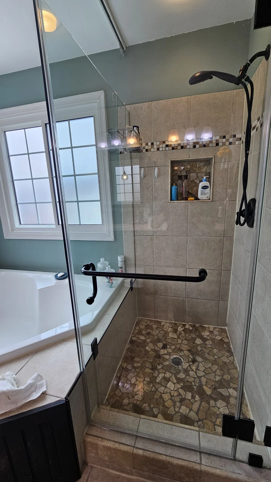 Clean shower glass after bathroom cleaning